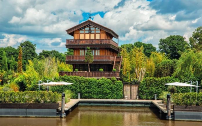 A Cut Cost Chalet – The Chalet, Hampton Court Road, East Molesey, Surrey, KT8 9BP – UK’s weirdest home for sale for a sum 61% lower than its 2016 £13m asking price; it has been repossessed and comes with a huge indoor beach – On the market with Savills for £5 million ($6.9 million, €5.6 million or درهم25.3 million) on behalf of LPA Receivers in March 2018; down from £13 million ($17.9 million, €14.6 million or درهم65.9 million) in August 2016.