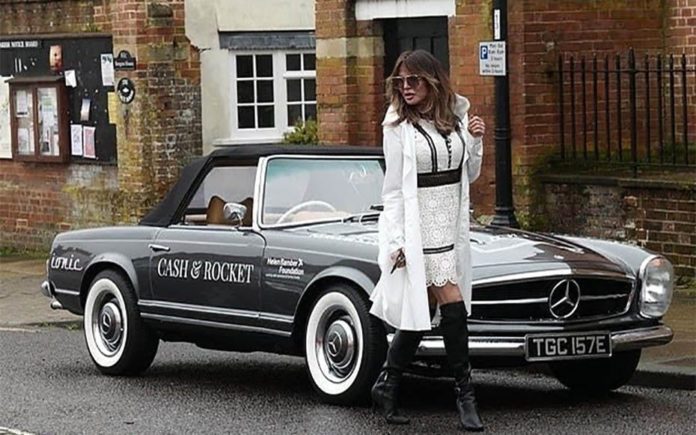 Lizzie Replaces Ghislaine – Lizzie Cundy, Ghislaine Maxwell, Cash & Rocket rally – With paedophile Jeffrey Epstein’s alleged madam Ghislaine Maxwell still missing, knicker flasher Lizzie Cundy steps into the breach in the forthcoming 2020 Barcelona to Florence Cash & Rocket rally.