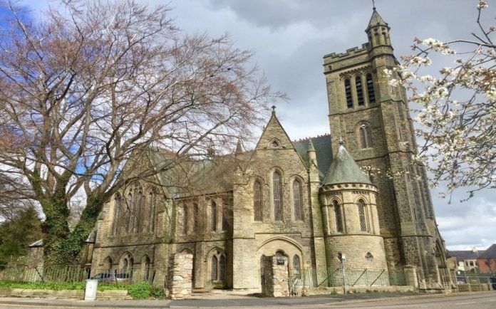 Not Such Divine Intervention – £130,000 for North Trinity Church, East Bowmont Street, Kelso, Roxboroughshire, Scotland, TD5 7JH, United Kingdom through agents Ballantynes – Empty Gothic church in Kelso, Scotland for sale for just £130,000; it was home until 2006 to the conspiracy theorist Dean Warwick (1944 – 7th October 2006) – who collapsed and died on stage at the Probe International paranormal and UFO conference in Blackpool mid speech.