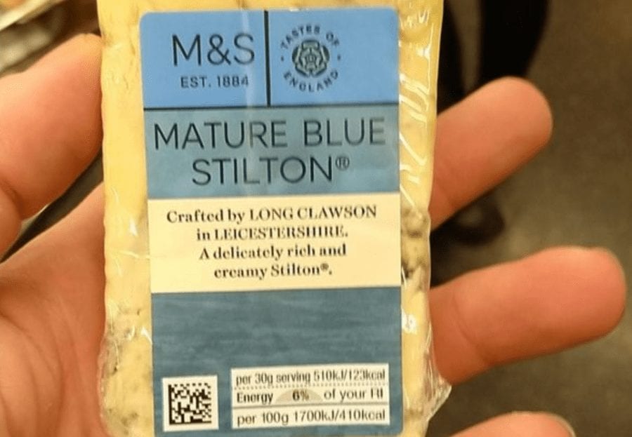 Stung by Stilton, Done by Detail 2021 – Stilton conviction – Liverpool drug dealer Carl Stewart sent down after sharing an image of a block of Marks & Spencer mature blue stilton in the palm of his hand is a reminder of the curious case of Max Clifford and his “short penis.”