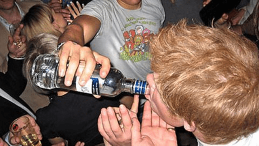 Prince Harry boozing from bottle