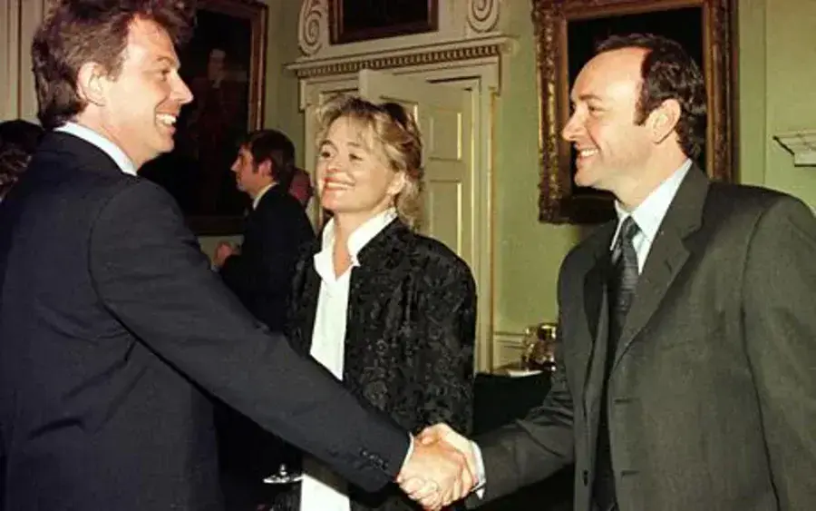To Prime Ministers… With alleged war criminal Sir Tony Blair.